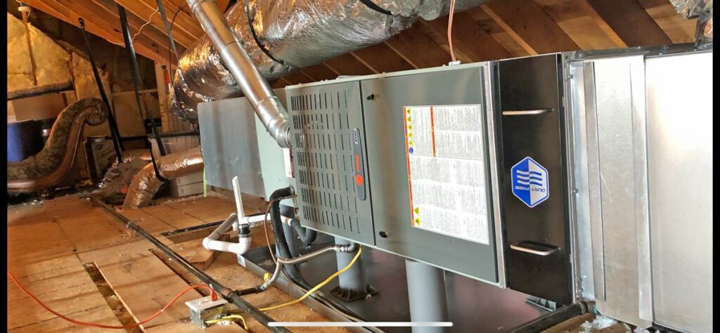 Furnace with a whole-home air cleaner installed in a utility space