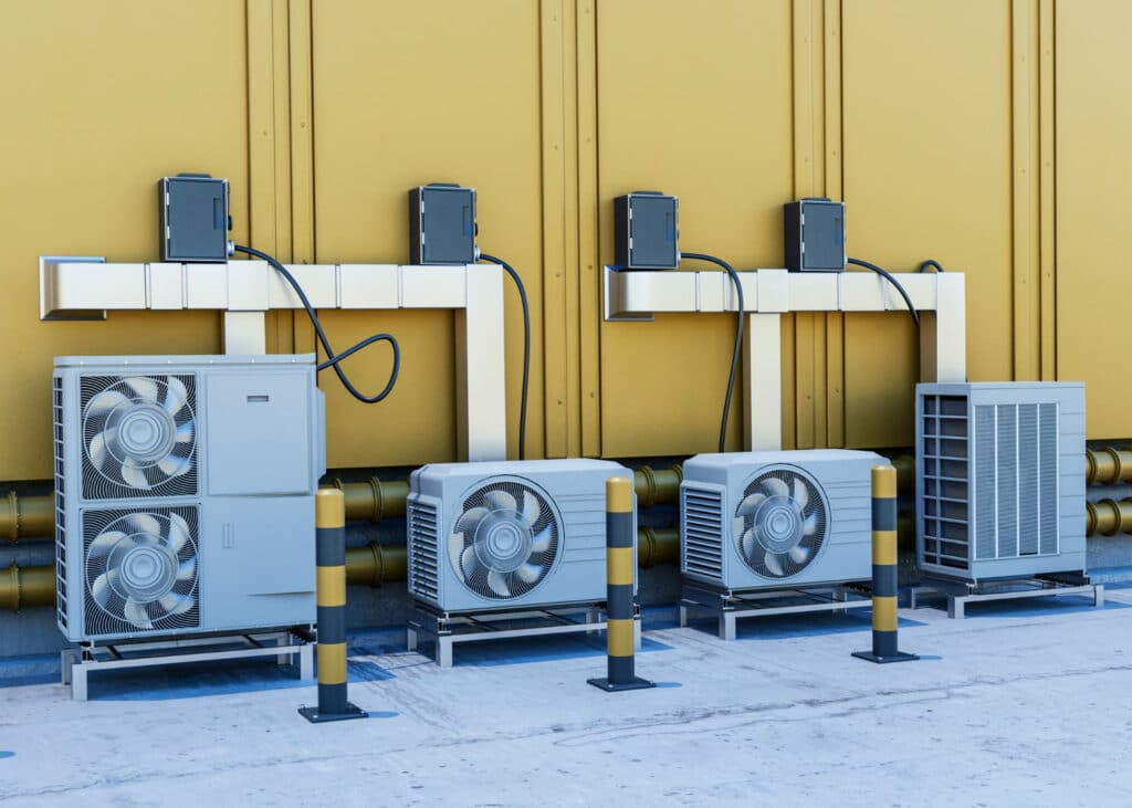 Row of outdoor heat pump condenser units